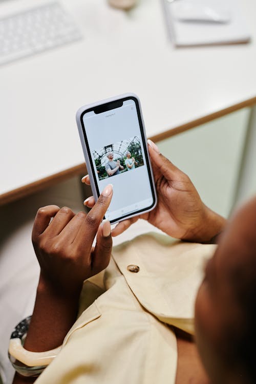 Person checking social media notifications on a smartphone