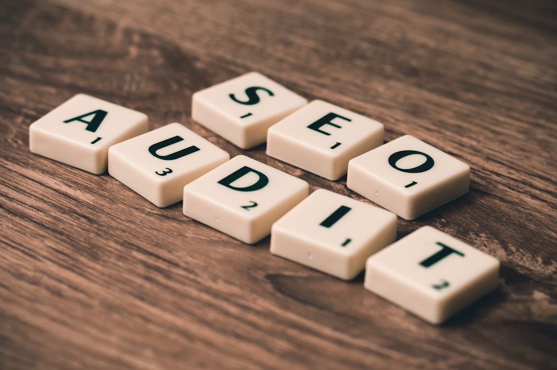 Scrabble tiles spelling SEO on a wooden surface