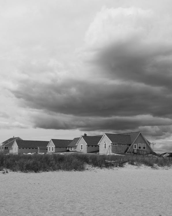 Coastal homes under dramatic skies in Massachusetts